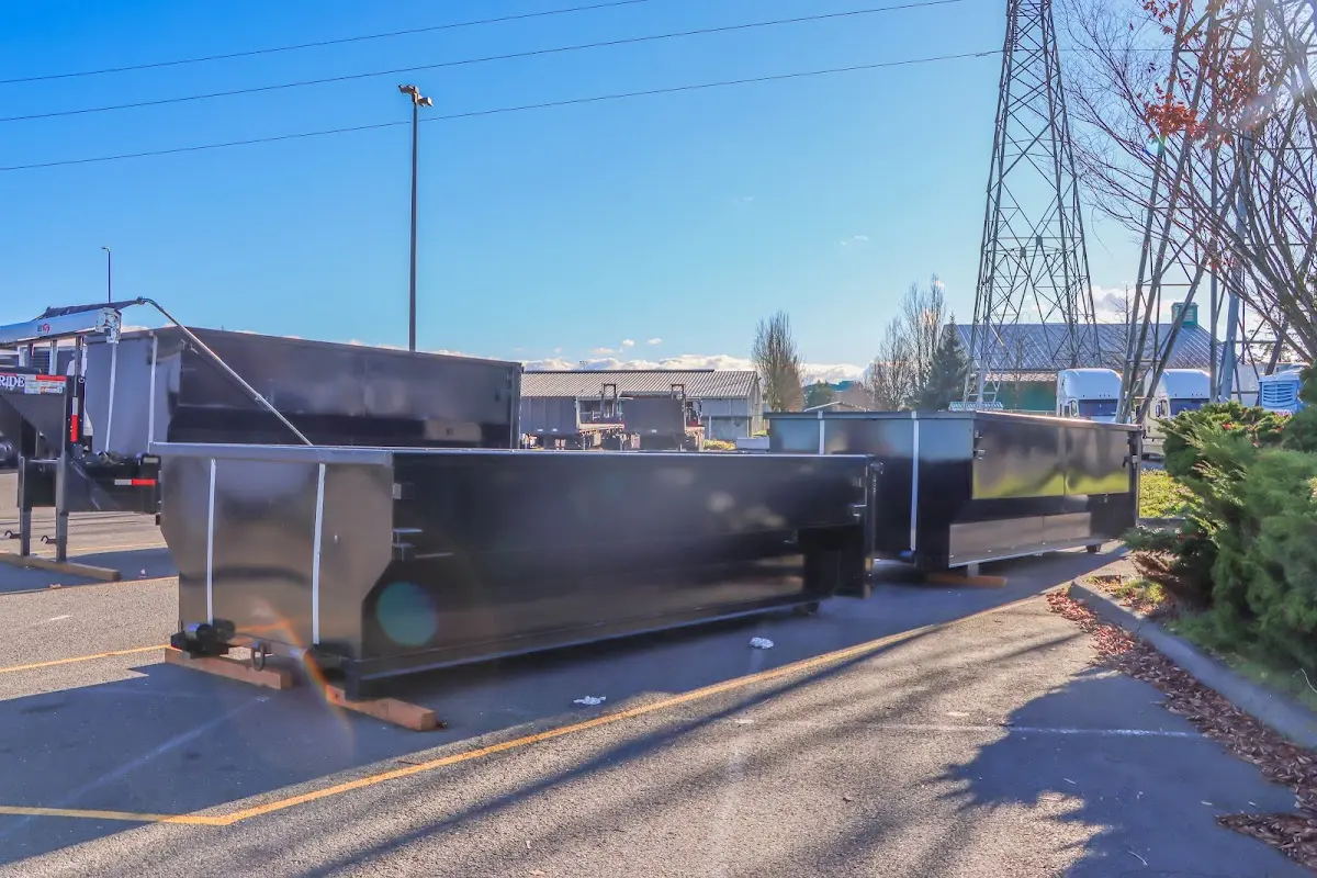 Roll-off dumpster ready for waste disposal at job site for Concrete Dumpster Rental in Spartanburg